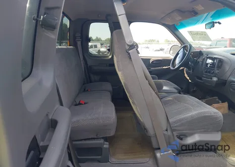 1999 Ford F150 z USA, uszkodzony, nr VIN 1FTRX18W4XNA64993